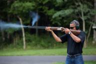 President Barack Obama shoots clay targets on the range at Camp David, Md., Saturday, Aug. 4, 2012. (Official White House Photo by Pete Souza) This official White House photograph is being made available only for publication by news organizations ...