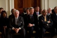 Sen. Edward Kennedy, D-Mass., Sen. Max Baucus, D-Mont., and Rep. Charlie Rangel, D-N.Y., listens to President Obama (Pete Souza/ Rapport Syndication