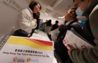 Job seekers line up to enter the 2024 Hong Kong Top Talent Recruitment Fair, hosted by the Hong Kong Top Talent Services Association at Shun Tak Centre in Sheung Wan. 03MAR24. SCMP \/ May