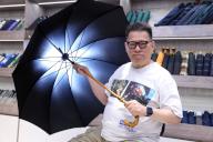 Leung So Kee umbrella owner Leung Mang-sing is pictured at Leung So Kee shop at Park Lane Shopperâs Boulevard in Tsim Sha Tsui. Leung So Kee umbrella since 1885 which is a most famous umbrella manufacturer and retailer in Hong Kong.17APR24 SCMP