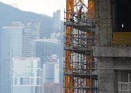 High-above-ground work at a construction site in West Kowlooon Cultural District. 17APR24. SCMP \/ Eugene