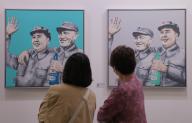 People visit the Affordable Art Fair at the Hong Kong Convention and Exhibition Centre, Wan Chai. 19MAY23 SCMP / Jelly