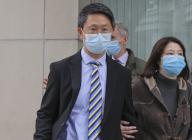 Lam Chi-kwan (middle), doctor of United Christian Hospital, leave the Eastern court in Sai Wan Ho. He and fellow doctor Chan Siu-kim, are charged with manslaughter over the death of Tang Kwai-sze, 44, in 2017. The manslaughter case involves an 