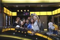 People pose for pictures at the President Theatre in Causeway Bay after all tickets were sold out on its last day of business. The President Theatre in Hong Kongâs bustling Causeway Bay closed for good on April 30, 2024 after nearly 60 years of 
