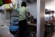 Coco Chan, 53, who lives in a subdivided flat with her 12-year-old son, is pictured in Kwun Tong. 24OCT23 SCMP/Yik Yeung
