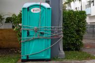 (220928) -- MIAMI, Sept. 28, 2022 (Xinhua) -- A portable toilet is roped to a concrete post in Miami, Florida, the United States, Sept. 27, 2022. A hurricane warning has been extended southward on the west coast of the U.S. state of Florida to Chokoloskee, forecasters said Tuesday evening. (Photo by Monica McGivern/Xinhua) - Monica McGivern -//CHINENOUVELLE_XxjpbeE007139_20220928_PEPFN0A001/2209281004/Credit:CHINE NOUVELLE/SIPA