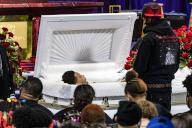 Daunte Wrights brother stands at his brothers casket during a memorial service at Shiloh Temple International Ministries in Minneapolis, M.N., U.S., on Tuesday, April 20, 2021. Wright was shot by police officer Kimberly Ann Potter who claims she thought she was deploying a taser when Wright attempted to flee police when they attempted to place him under arrest for an outstanding warrant during a traffic stop for expired registration tags. Credit: Samuel Corum / CNP//Z-ADMEDIA_adm_042121_BrooklynCenter_CNP_018/2104272141/Credit:CNP/AdMedia/SIPA