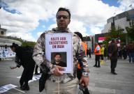 PARIS, RASSEMBLEMENT OPPOSANTS IRANIENS. Plusieurs centaines de personnes ont manifestes contre lÃ¢&#x80;&#x99;execution en Iran du jeune rappeur Toomaj. Dozens of people gathered in Paris to protest against the execution of the young musician Toomaj in Iran. France le 28.04.2024. Credit: SEVGI\/SIPA\/\/SEVGI_SEVGI0293\/Credit:SEVGI\/SIPA