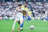 (240505) --MADRID, May 5, 2024 (Xinhua) -- Real Madrid\'s Fran Garcia (L) vies with Cadiz CF\'s V. Chust during the Spanish league (La Liga) football match between Real Madrid and Cadiz CF in Madrid, Spain, May 4, 2024. (Photo by Gustavo Valiente\/Xinhua) - Gustavo Valiente -\/\/CHINENOUVELLE_CHINE0422\/Credit:CHINE NOUVELLE\/SIPA
