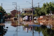 (240507) -- NOVO HAMBURGO, May 7, 2024 (Xinhua) -- People walk in a flooded street in Novo Hamburgo, in the state of Rio Grande do Sul, Brazil, May 6, 2024. Severe storms have inundated large swaths of south Brazil\'s Rio Grande do Sul state since April 29. Over 100,000 people have been evacuated in 334 cities of the state. (Photo by Claudia Martini\/Xinhua) - Ke LaodiyaÃÂ·maertini -\/\/CHINENOUVELLE_chinenouvelle0165\/Credit:CHINE NOUVELLE\/SIPA