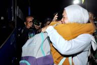 (240512) -- WEST JAVA, May 12, 2024 (Xinhua) -- A woman embraces her son, a passenger who has survived a bus accident, as he arrives in Depok, West Java, Indonesia, on May 12, 2024. Ten people were killed and more than 10 others wounded in a bus accident in Subang regency of Indonesia