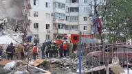 (240513) -- MOSCOW, May 13, 2024 (Xinhua) -- This screen shot released by the Russian Ministry of Emergency Situations on May 12, 2024 shows rescuers working at the scene of a collapsed residential building in Belgorod, Russia. The death toll climbed to 14 from the collapse of the residential building in Russia