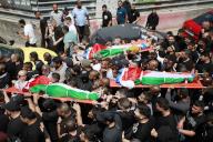 Mourners carry the bodies of three Palestinians who were killed in an Israeli raid, during their funeral in Tulkarm, in the Israeli-occupied West Bank, May 16, 2024. Photo by Mohammed Nasser apaimages//APAIMAGES_apa.0145/Credit:Mohammed Nasser apaimag/SIPA