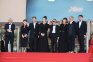 (FromL) Japanese producer Shozo Ichiyama, Chinese writer Jiahuan Wan, Chinese actor You Zhou, Chinese actress Zhao Tao, Chinese director Zhangke Jia, actress Amy Chang and guests arrive for the screening of the film "Feng Liu Yi Dai" (Caught By the Tides) at the 77th edition of the Cannes Film Festival in Cannes, southern France, on May 18, 2024. //03HAEDRICHJM_1904.07538/Credit:JM HAEDRICH/SIPA