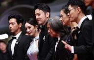 (240525) -- CANNES, May 25, 2024 (Xinhua) -- Director Peter Ho-sun Chan (4th L) and cast members arrive for the screening of the film "She