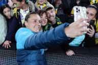 Hayley Rasso of Australia takes a selfie with fans during the Women