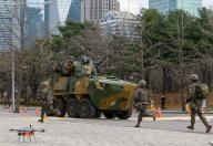 South Korean soldiers with Sky Tiger Anti-Aircraft Gun-Wheeled Vehicle in a joint counter-terrorism drill on the sidelines of the annual Freedom Shield joint military exercise between South Korea and the United States, at the KBS headquarters. South Korea