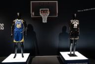 Stephen Curry and Sabrina Ionescu complete uniform worn during NBA vs. WNBA 3-point challenge at 2024 All-Star on display during press preview for the Sotheby