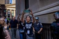 NEW YORK, NEW YORK - APRIL 15: Laura Loomer, an American far-right, white nationalist and conspiracy theorist videos pro-Palestinian protesters outside of the New York Stock Exchange (NYSE) on April 15, 2024 in New York City. (Photo by Michael Nigro/Sipa USA
