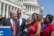 United States Representative Lloyd Doggett (Democrat of Texas), left, and United States Representative Marc Veasey (Democrat of Texas), second from left, join Texas State Representative Senfronia Thompson (D-District 141), dean of the Texas House of Representatives, third from right, as she leads the the group in the song We Shall Overcome) during a press conference on voting rights outside the US Capitol in Washington, DC, Tuesday, July 13, 2021. In an effort to block Republicans from enacting new voting restrictions, these Texas state House of Representatives arrived at Dulles International Airport last evening after fleeing their state in a pair of charter jets. Credit: Rod Lamkey / CNP/Sipa