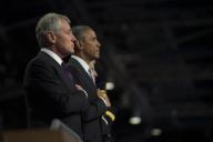 Defense Secretary Chuck Hagel, and President Barack Obama, place their hands over their heart during the playing of the national anthem during the Armed Forces Farewell Tribute to Hagel on Joint Base Myer-Henderson Hall in Arlington, Va., Jan. 28, ...