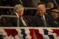 Defense Secretary Chuck Hagel and Vice President Joe Biden share a laugh during the Armed Forces Farewell Tribute to Hagel on Joint Base Myer-Henderson Hall in Arlington, Va., Jan. 28, 2015. President Barack Obama hosted the event, which included ...