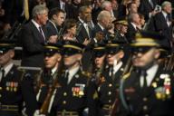 Secretary of Defense Chuck Hagel observes a pass in review during the Armed Forces Farewell Tribute to Hagel on Joint Base Myer-Henderson Hall in Arlington, Va., Jan. 28, 2015. Obama hosted the event, which included remarks by Biden and Army Gen. ...
