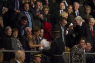 Lilibet Hagel, wife of Secretary of Defense Chuck Hagel, is recognized for her service with a bouquet of flowers during the Armed Forces Farewell Tribute to Hagel on Joint Base Myer-Henderson Hall in Arlington, Va., Jan. 28, 2015. Obama hosted the ...