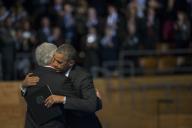 Secretary of Defense Chuck Hagel hugs President Barack Obama on his way to the podium to deliver his farewell address during the Armed Forces Farewell Tribute to Hagel on Joint Base Myer-Henderson Hall in Arlington, Va., Jan. 28, 2015. Obama hosted ...