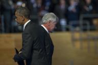 Secretary of Defense Chuck Hagel hugs President Barack Obama on his way to the podium to deliver his farewell address during the Armed Forces Farewell Tribute to Hagel on Joint Base Myer-Henderson Hall in Arlington, Va., Jan. 28, 2015. Obama hosted ...