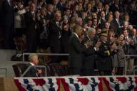 Secretary of Defense Chuck Hagel receives a standing ovation after delivering his farewell address during the Armed Forces Farewell Tribute to Hagel on Joint Base Myer-Henderson Hall in Arlington, Va., Jan. 28, 2015. Obama hosted the event, which ...