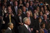 WASHINGTON (Jan. 28, 2015)-- Audience members take photographs as President Barack Obama arrives at the Armed Forces Farewell Tribute to Secretary of Defense Chuck Hagel on Joint Base Myer-Henderson Hall in Arlington, Va., Jan. 28, 2015. Obama ...