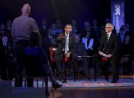 US President Barack Obama (C) answers a question from Arizona Sheriff Paul Babeu during a live town hall event with CNN