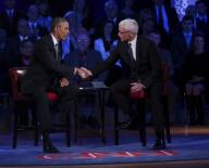 US President Barack Obama shakes hands with CNN