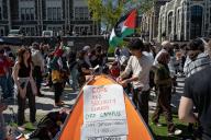 City College of New York (CCNY) students set up a "Palestine Solidarity" tent encampment in the quad outside of the High School for Math, Science and Engineering on April 25, 2024 in New York City. (Photo by Derek French \/ SOPA Images\/Sipa USA