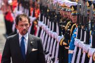 Sultan of Brunei Hassanal Bolkiah, inspects the guard of honor during a welcoming ceremony at Government House. Sultan of Brunei Hassanal Bolkiah and Prince Abdul Mateen are on a two-days official visit to Thailand that aim to strengthen the two nations especially in investment, halal industry, and tourism. (Photo by Peerapon Boonyakiat \/ SOPA Images\/Sipa USA