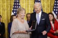 U.S. President Joe Biden stands with Lynn Cannon after posthumously awarding her late grandfather, Native American athlete Jim Thorpe with the Presidential Medal of Freedom, the countrys highest civilian honor, during a ceremony in the East Room of the White House in Washington, DC on Friday, May 3, 2024. Several of todays recipients are Democratic Party stalwarts, and Biden himself was awarded the honor by former President Barack Obama in the final days of their administration in 2017. Photo by Jonathan Ernst\/Pool\/Sipa