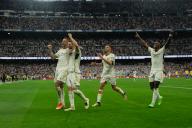 From left to right, Joselu, Nacho, Brahim Díaz and Vinicius Jr celebrate Real Madrid\'s 3-0 victory against Cadiz this afternoon at the Santiago Bernabeu stadium. Real Madrid this afternoon became champion of the League after beating Cadiz at the Santiago Bernabeu stadium by 3 goals to 0 with goals from Brahim, Bellingham and Joselu and after CF Barcelona lost to Girona. (Photo by David Canales \/ SOPA Images\/Sipa USA