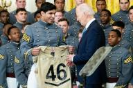 President Joe Biden receving a "Biden" #46 jersey at an event where he presented the Commander-in-Chiefs Trophy to the United States Military Academy Army Black Knights, at the White House in Washington, D.C. (Photo by Michael Brochstein\/Sipa USA