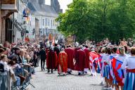 The procession moves through the town during the Catholic festival of the Procession of the Holy Blood on Ascension Day. Celebrating Ascension Day in Bruges, Belgium, the city comes alive with the annual Catholic festival featuring the renowned Procession of the Holy Blood. Participants don elaborate religious and historical costumes, adding to the solemnity and grandeur of the event. Streets are transformed into vibrant displays of faith and tradition as the procession winds its way through the city, drawing crowds of devout worshippers and curious onlookers alike, capturing the essence of centuries-old religious customs and cultural heritage. (Photo by Michael Currie \/ SOPA Images\/Sipa USA