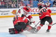 PRAGUE, CZECH REPUBLIC - MAY 11: Nick Olesen of Denmark battles for the puck against goalkeeper David Madlener of Austria (L) and Benjamin Nissner of Austria (R) during the preliminary round match between Austria and Denmark at Prague Arena on May 11, 2024 in Prague, Czech Republic. (Photo by Andrea Branca\/Just Pictures\/Sipa USA