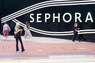 Pedestrians walk past the French multinational personal care and beauty retail brand Sephora store in Hong Kong. (Photo by Sebastian Ng / SOPA Images/Sipa USA