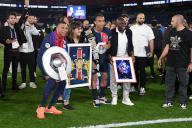 Kylian Mbappe, Fayza Lamari, Ethan Mbappe, Wilfrid Mbappe during the 2023-2024 Ligue 1 championship trophy ceremony following the French L1 football match between Paris Saint-Germain and Toulouse FC at the Parc des Princes stadium in Paris on May 12, 2024. Photo by Lionel Urman/Abaca/Sipa