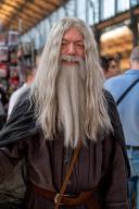 A Cosplayer dressed as Gandalf from The Lord of the Ring poses for a photo at Comic Con Brussels 2024. Cosplay enthusiasts and fans of fantasy and sci-fi were treated to a spectacular display of talent and nostalgia at Comic Con Brussels 2024. The event welcomed esteemed actors from beloved franchises, including Dominic Monaghan, Billy Boyd, and Andy Serkis from 