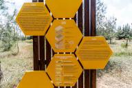 A sign is seen explaining the structure of a beehive and the bee life cycle, Nicosia, Cyprus, on Apr. 12, 2024. Bees are considered a valuable species for the ecosystem and the Athalassa beekeeping park has opened to alert people about that fact. (Photo by Kostas Pikoulas/Sipa USA