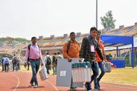Ranchi, May 12, 2024 (ANI): Polling officials leave after collecting EVMs and other election materials on the eve of the fourth phase of Lok Sabha polls, at Birsa Munda Football Stadium in Ranchi on Sunday. (ANI Photo via Hindustan Times/Sipa USA