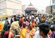 Varanasi, May 12, 2024 (ANI): Devotees visit the Kashi Vishwanath Temple to offer prayers, in Varanasi on Sunday. (ANI Photo via Hindustan Times/Sipa USA/Shrikant Singh