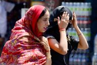 Jalandhar, May 13, 2024 (ANI): Women cover themselves to protect from the sun on a hot summer day, in Jalandhar on Monday. (ANI Photo via Hindustan Times/Sipa USA