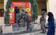 Srinagar, May 12, 2024 (ANI): Polling officials along with security personnel arrive at a red polling station on the eve of the fourth phase of the Lok Sabha polls, in Srinagar on Sunday. (ANI Photo via Hindustan Times/Sipa USA