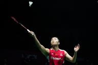 Lu Guang Zu of China plays against Lee Zii Jia of Malaysia (not pictured) during the Badminton Men